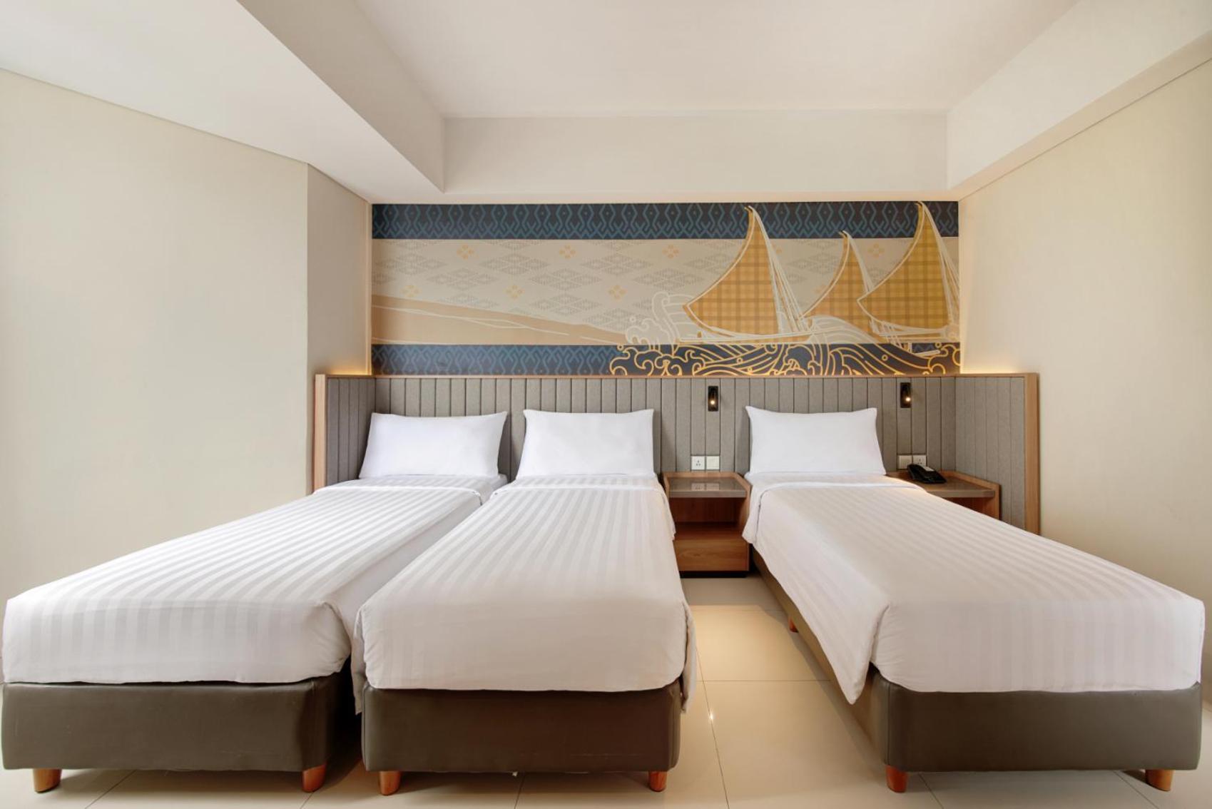 Aston Inn Pantai Losari Макасар Экстерьер фото